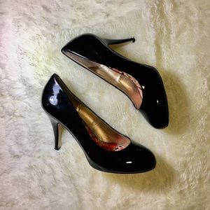 black patten leather heels